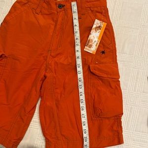 Urban Up Orange Board Shorts lots of pockets with inside mesh. Size 16 youth